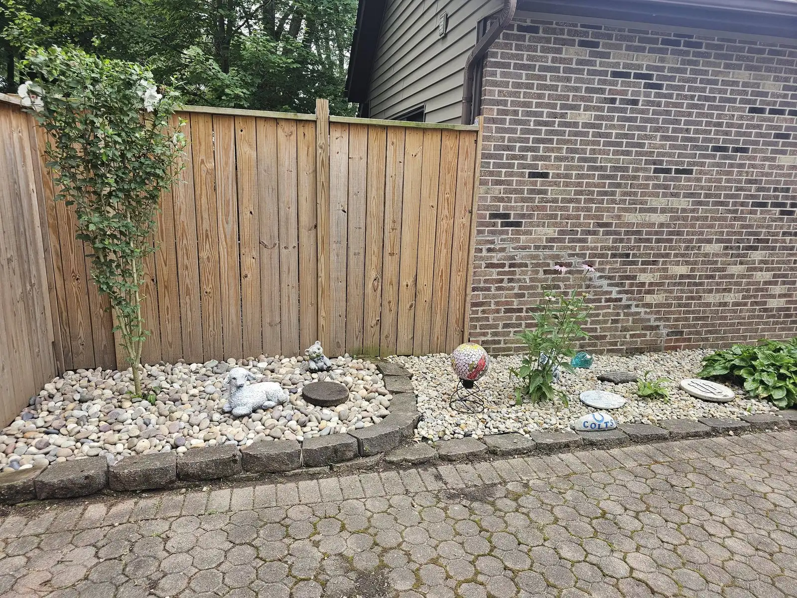 After: fence corner bed, cleaned up and re-landscaped
